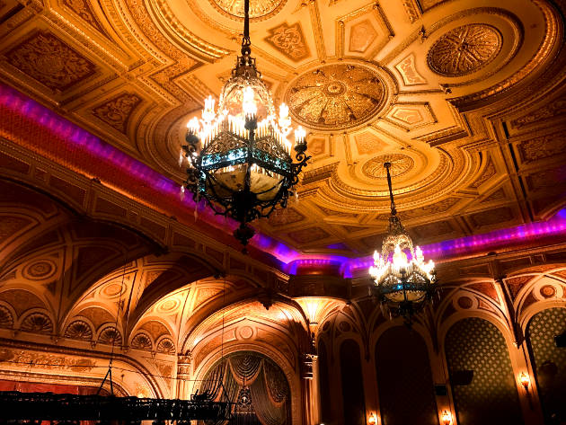 Beautiful chandeliers hanging in the auditorium of The Orpheum Theatre